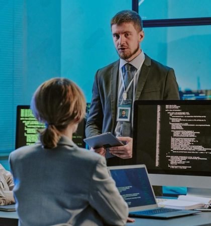 three-young-people-having-meeting-cybersecurity-department-office_249974-26767